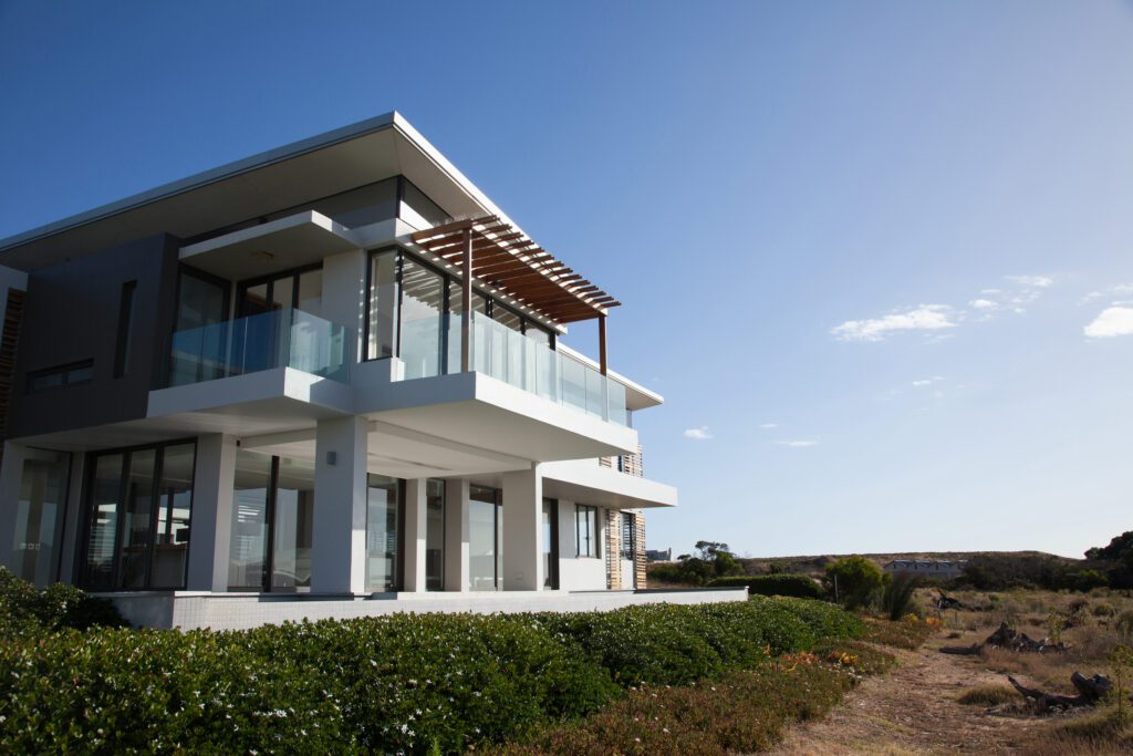 Modern beachfront house with glass balconies